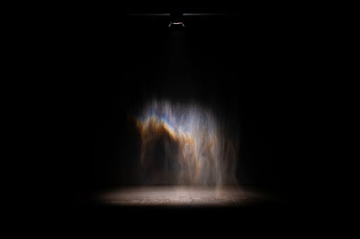 Beauty (1993) by Olafur Eliasson. Installation view, Gallery of modern Art, Brisbane. Visitors enter the darkened gallery to encounter a rainbow suspended in a veil of mist.