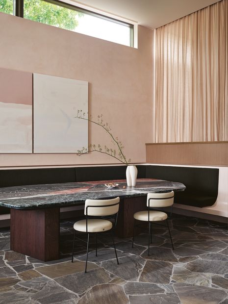 Bluestone crazy paving was used for the indoor kitchen and dining area and the adjoining outdoor area.