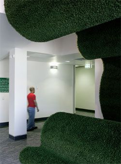  Landscape or giant animal,       Undulant  ’s shaggy green folds represent “Nature” within the restrained space of the waiting room. 