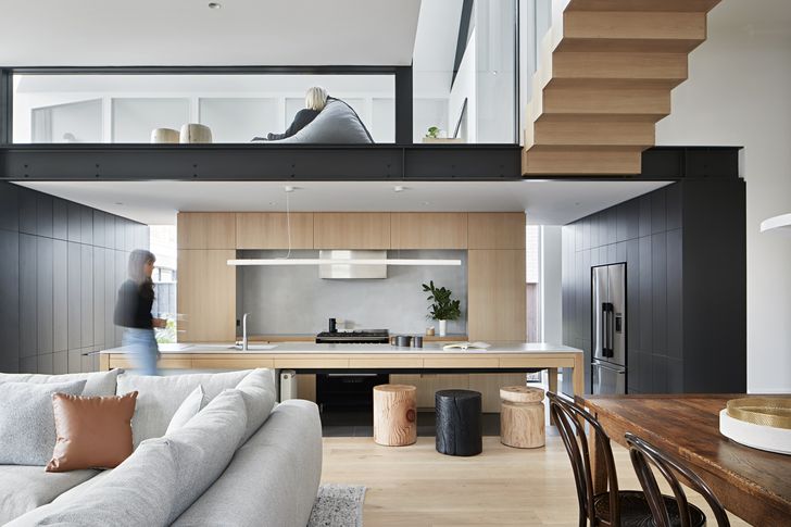 The sunken kitchen’s lowered ceiling adds to the space’s cosiness.