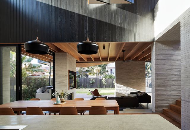 A layering of indoor and outdoor spaces defines the spatial arrangement of this coastal Sydney home.