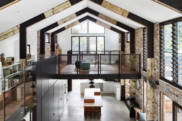 The double-height living space conforms to the gable-roofed extrusion of the barn typology.