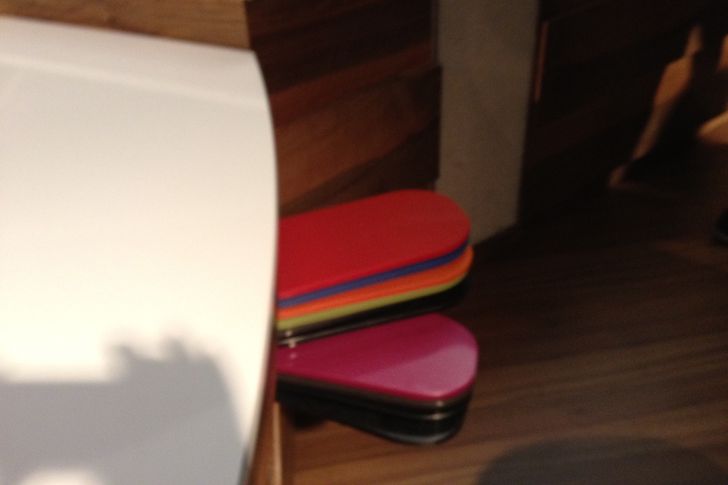 A multi-coloured palette swatch attached to one bench indicates the large colour range.