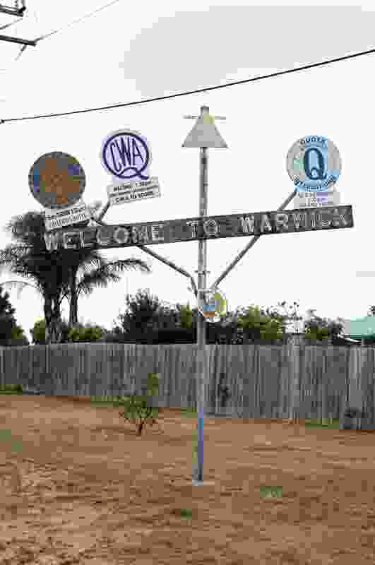 In Warwick, Queensland, a rickety crucifix sprouts the shields of the town’s service clubs: Rotary, the Country Women’s Association, Lions, Apex, Quota International.