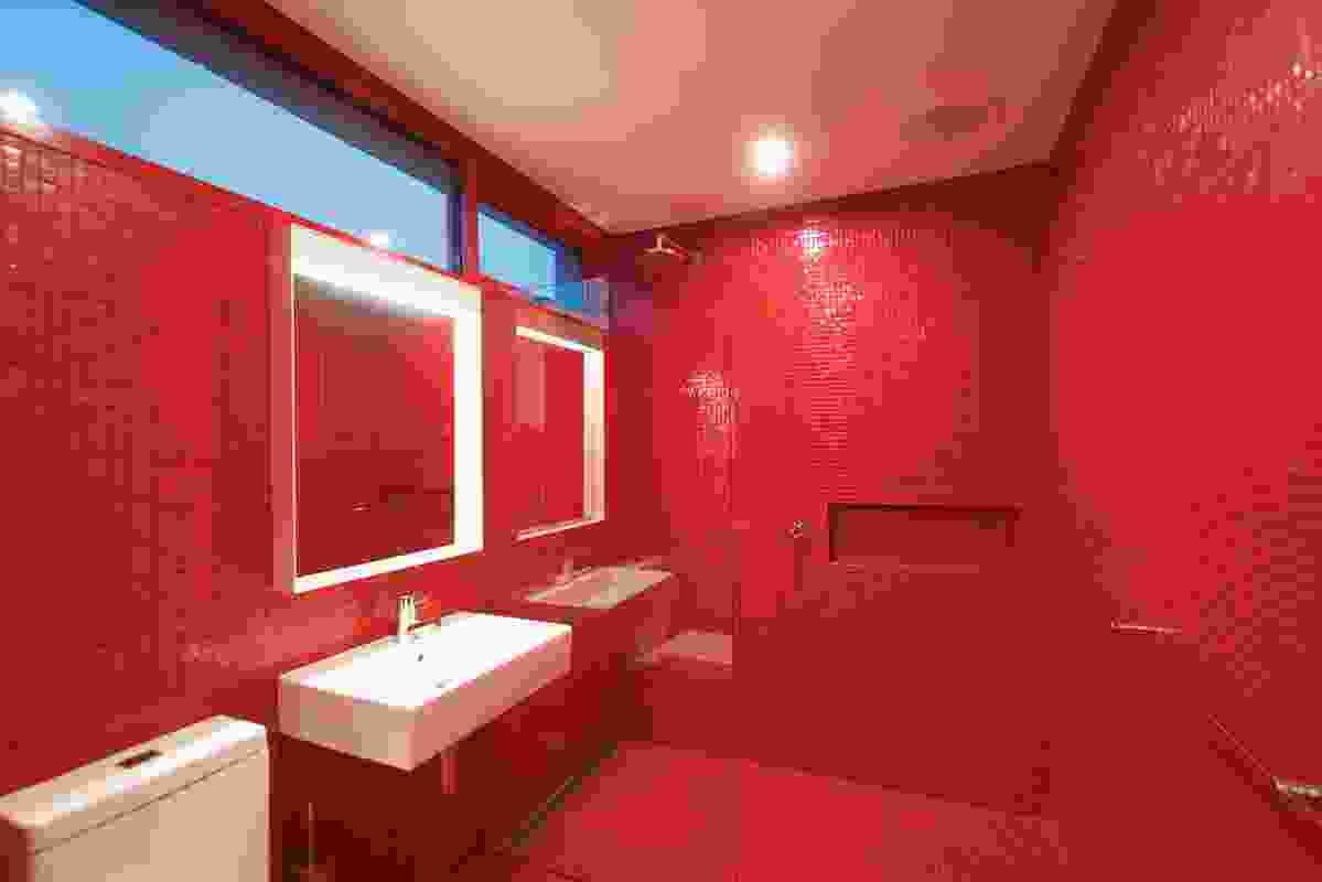 A Stanley-Kubrick-style all-red bathroom.