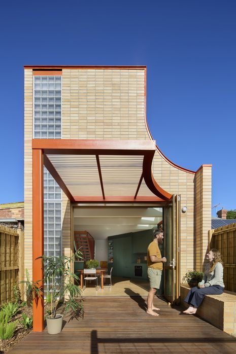 The ground-floor deck extends the living space into the garden.