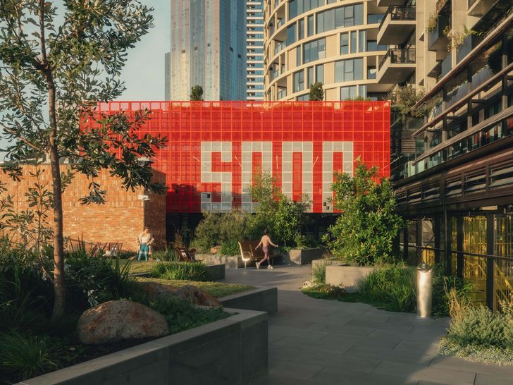 Rose Nolan’s artwork on the exterior screens of the community hub facade both adds visual interest and acts as a heat-control device.