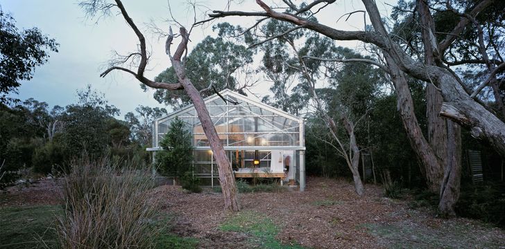 The house is pared down to the barest of essentials: a steel shed kit with polycarbonate cladding, three large facade walls, a raised deck, timber mezzanine and plumbing.