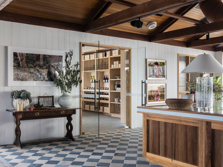 The tasting room features an oversized blackbutt counter with preweathered zinc, adding instant aged patina.