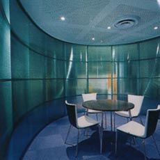  One of the meeting rooms defined by a translucent polycarbonate screen. Image: Shannon McGrath. 