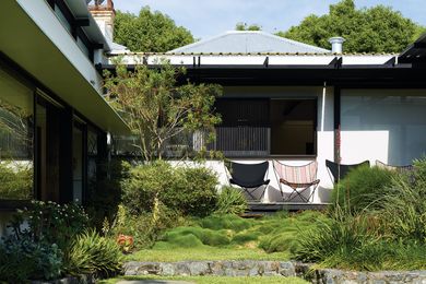 Behind its more traditional facade, Aperture House unfolds into an inviting garden that opens to a generous expanse of sky.