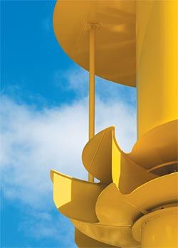 Detail of one of the wind turbines crowning the building. Image: Dianna Snape