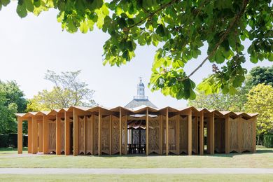 The pavilion is a circular timber structure with a birch plywood roof.