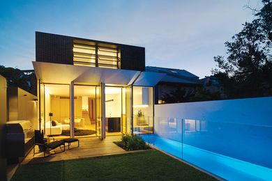 The small rear backyard features a plunge pool along the western boundary.