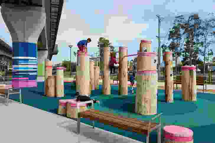 At Noble Park station, a parkour course built from unsawn logs dare local residents to clamber on top.