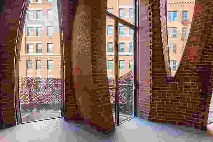 A double skin of bricks forms the facade’s corbelled walls; like the branches of a tree, they help to distribute the structural load.
