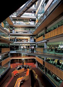 Looking south down the eastern atrium, with the main reception at its base.