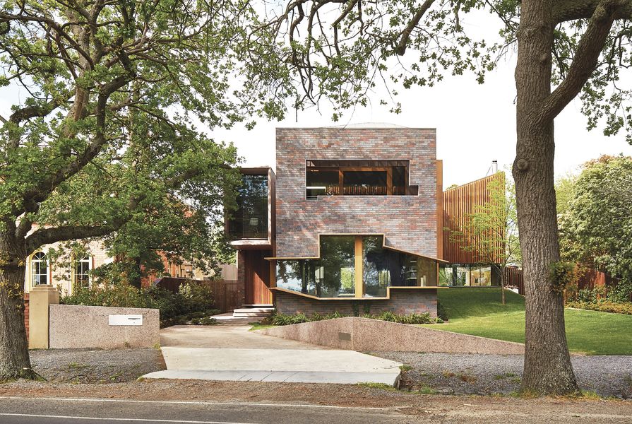 On the street elevation of the Lake Wendouree House, a highly figurative window forms an abstracted outline of the landscape and lake.