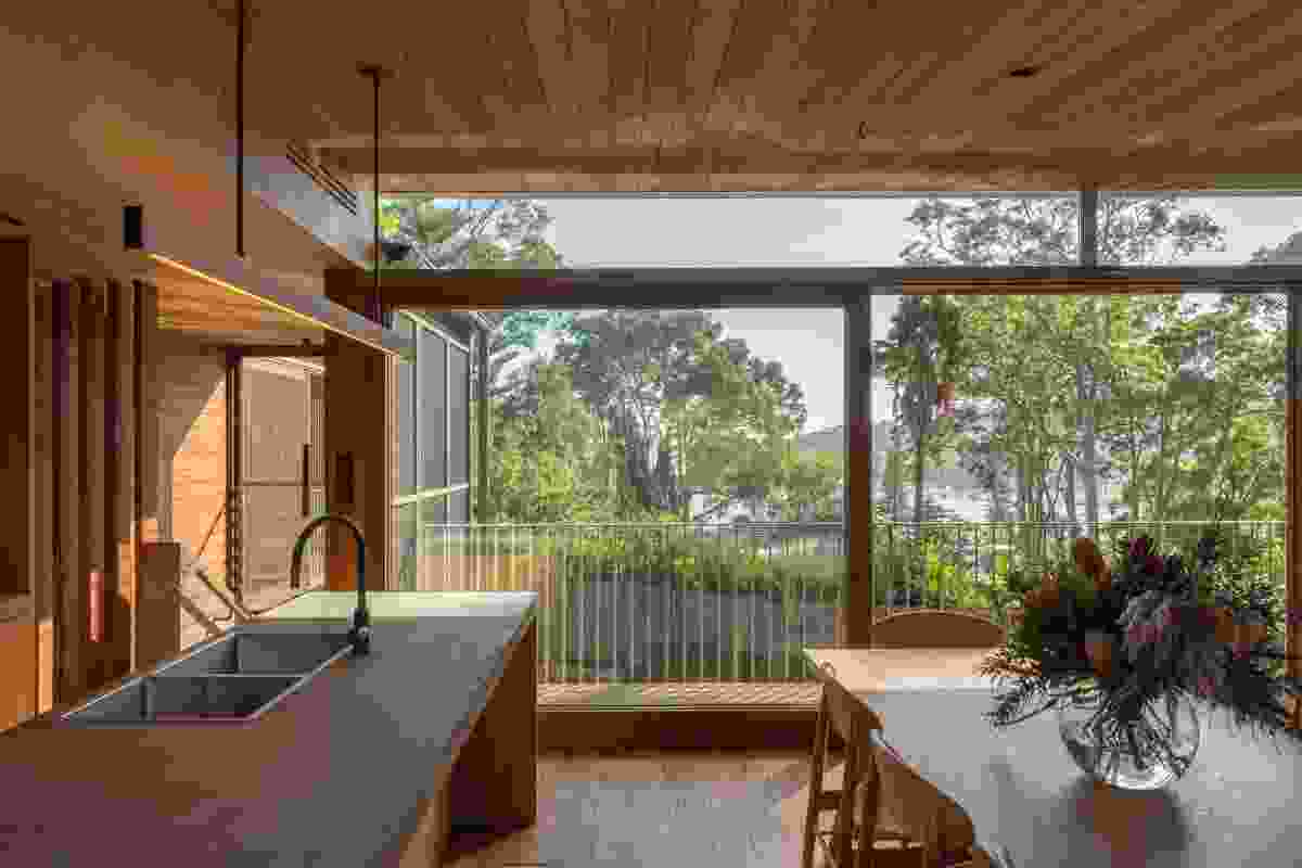 Main living spaces are oriented north toward Pittwater.