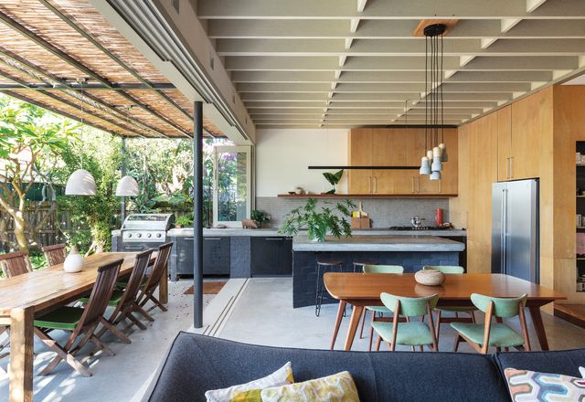 The kitchen and living area extend into the garden, making the most of the northern light.