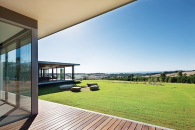 Floor-to-ceiling glazing captures the expansive views.