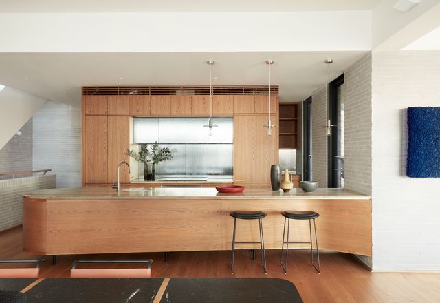 Timber joinery and reeded glass make the kitchen a worthy destination. Artwork: Zhuang Hong Yi.