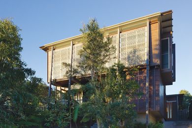 The facade with perforated anodized panels.