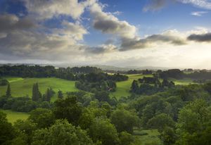 A view of the landscape park and countryside surrounding Newton House seen from the ruined medieval Dinefwr Castle.