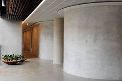  The curved concrete walls enclosing the meeting spaces on each level. Image: Marcus Clinton 