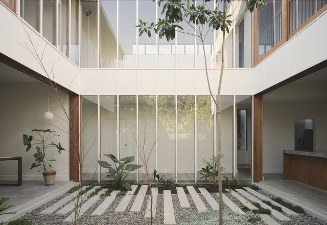 A courtyard divides the home into two volumes and gives it two northerly aspects.