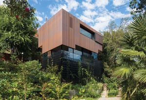 In time, the home will recede into the rambling landscape –its copper shroud will patina into washes of green and foliage will climb its blackened space frame.