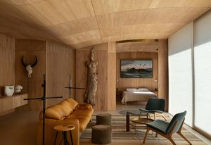 An undulating ceiling defines areas without the need for walls. Vase: Hiroe Swen; bark sculpture: Kim Perrier; painting: Jonathan Partridge.