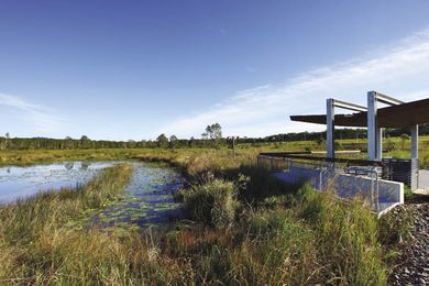 Shelters overlooking wetlands provide welcome surroundings for the workers of the industrial estate.