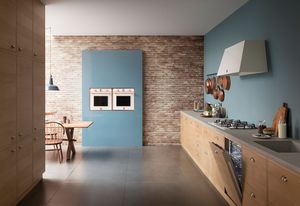 An in-built oven in ivory and rose gold by Bertazzoni.