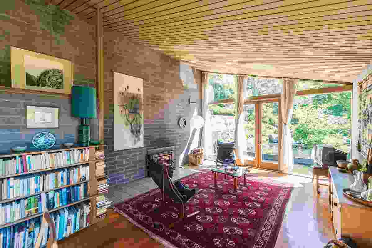 The living room. Artwork (L-R): Diana Mills; Max Angus.