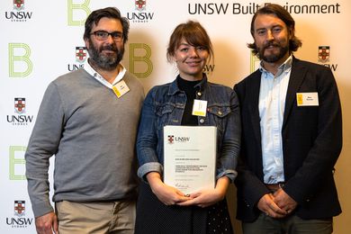 Arcadia principals Alex Longley and Michael Barnett present UNSW graduate Kaylie Salvatori with the Arcadia scholarship in 2019.