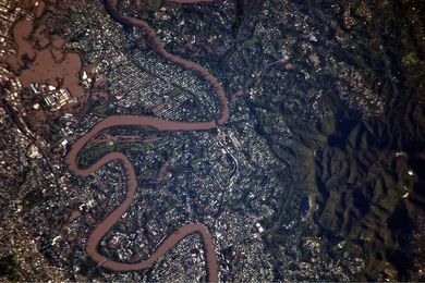 An aerial image of a partially-inundated Brisbane taken from the International Space Station during the 2011 floods that affected Queensland.