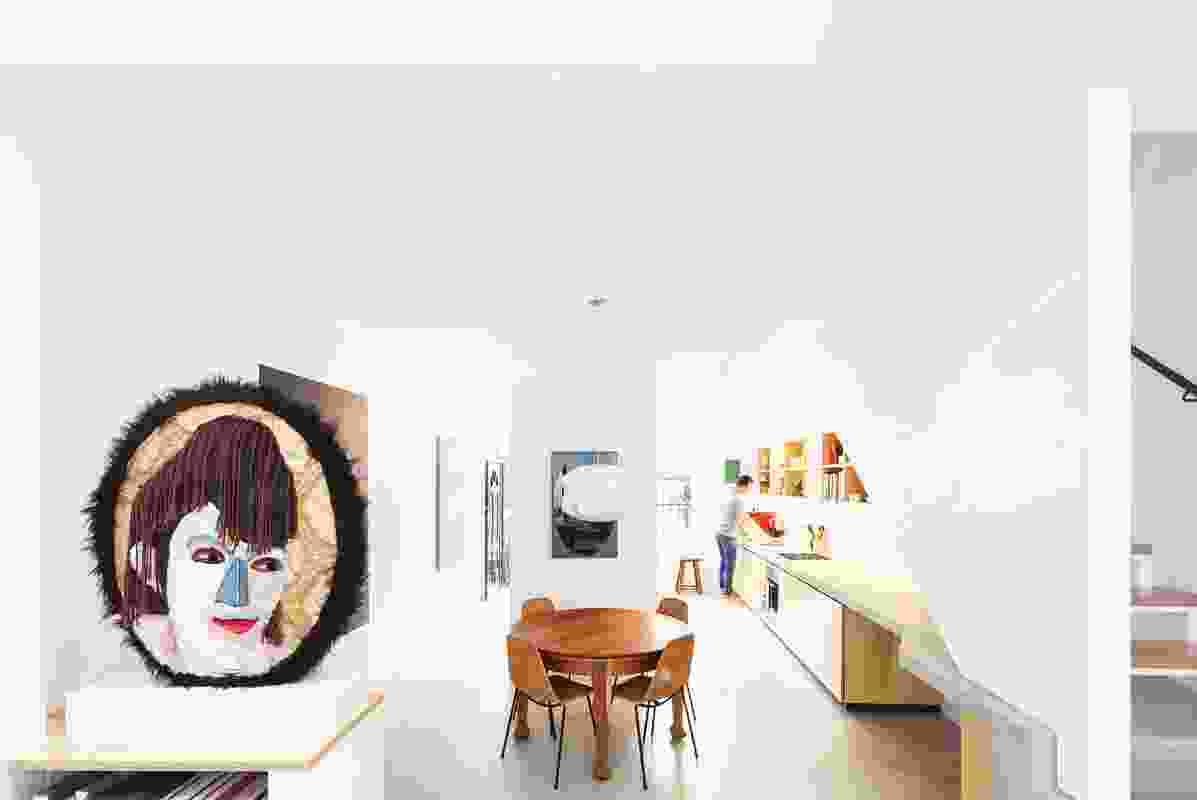 House Bruce Alexander (2008): A renovation of an inner-city terrace house demonstrates that high levels of amenity can be achieved within a tight footprint and budget. Artwork: Alan Jones (face).