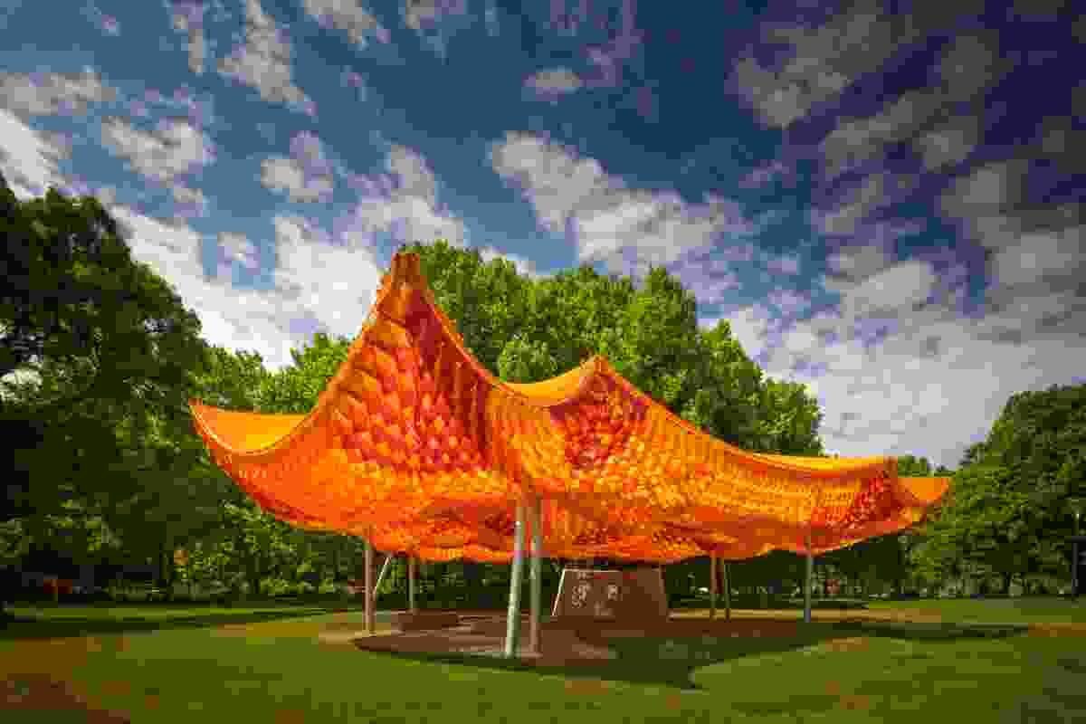 The design of the 2022 MPavilion is a three-layered canopy offering sun and rain protection, with an ever-changing interior atmosphere.