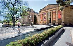 A linear pool with gentle waterfall bounds the space in front of the art gallery. Image: John Gollings