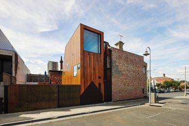 The three-storey, cedar-clad tower, connected to the original Victorian terrace, recalls Japanese architecture.