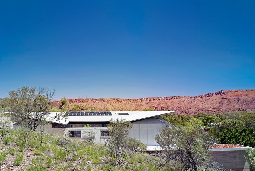 The Desert House opens to the west, where it confronts the surreal scale of the West MacDonnell Ranges.