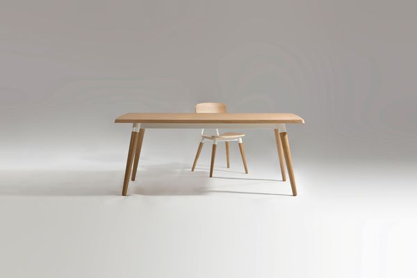 The Copine chair and table were inspired by a French school chair.