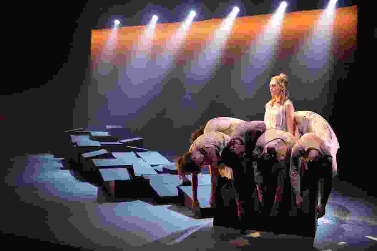 In one formation of the terrain, the seven dancers move together within the restricted space of one box.