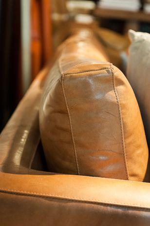 Verona leather in Walnut on Project 82 Lennon armchair.